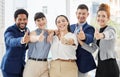 Business people, portrait and thumbs up for winning, good job or team success together at the office. Group of happy Royalty Free Stock Photo