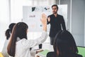 Business people proficiently discuss work project while sitting in circle Royalty Free Stock Photo