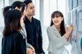 Business people proficiently discuss work project while sitting in circle Royalty Free Stock Photo