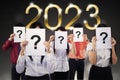 Business people with question mark and 2023 number Royalty Free Stock Photo