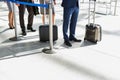 Business people queueing for check in airport