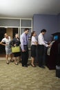 Business People Queuing At Vending Machine Royalty Free Stock Photo