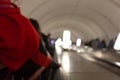 Business people rushing on the escalator in motion blur on the subway station. people on escalator. Blur Royalty Free Stock Photo