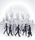 Business people rushing in front of city skyline Royalty Free Stock Photo