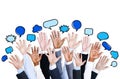 Business People's Hands Raised with Speech Bubble Royalty Free Stock Photo
