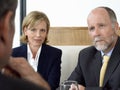 Business People In Serious Discussion At Restaurant Royalty Free Stock Photo