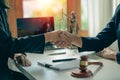 Business people shake hands to make an agreement male judge legal advisor A court litigation planning service contract after co-op Royalty Free Stock Photo