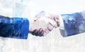 Business people shaking hands as symbol for partnership over city and nature landscape background Royalty Free Stock Photo