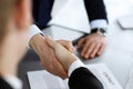 Business people shaking hands after contract signing in modern office. Teamwork, partnership and handshake concept Royalty Free Stock Photo