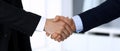 Business people shaking hands after contract signing in modern office. Unknown businessman, male entrepreneur with Royalty Free Stock Photo