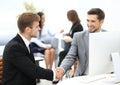 Business people shaking hands, finishing up a meeting Royalty Free Stock Photo