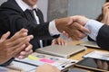 Business people shaking hands after finishing up a meeting. Businessman handshaking after conference. teamwork, partnership, coll Royalty Free Stock Photo
