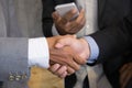 Business people shaking hands after finishing up a meeting. Businessman handshaking after conference. teamwork, partnership, coll Royalty Free Stock Photo