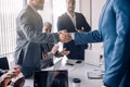 Business people shaking hands, finishing up a meeting Royalty Free Stock Photo