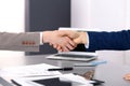 Business people shaking hands, finishing up a meeting. Papers signing, agreement and lawyer consulting concept Royalty Free Stock Photo