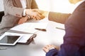 Business people shaking hands, finishing up a meeting. Papers signing, agreement and lawyer consulting concept Royalty Free Stock Photo