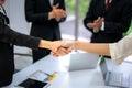 Business people shaking hands, finishing up a meeting to seal a deal with his partner business with colleague clap hands to Royalty Free Stock Photo