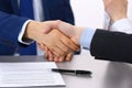 Business people shaking hands, finishing up a papers signing. Meeting, contract and lawyer consulting concept Royalty Free Stock Photo