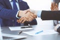 Business people shaking hands, finishing up a papers signing. Meeting, contract and lawyer consulting concept Royalty Free Stock Photo