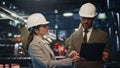 Business people shaking hands making deal on industrial factory close up. Royalty Free Stock Photo