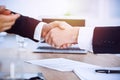 Business people shaking hands at meeting or negotiation in the office. Handshake concept. Partners are satisfied because Royalty Free Stock Photo