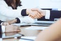 Business people shaking hands at meeting or negotiation in the office. Handshake concept. Partners are satisfied because Royalty Free Stock Photo