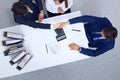 Business people shaking hands at meeting, view from above. Bookkeeper or financial inspector making report, calculatin Royalty Free Stock Photo