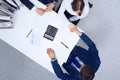 Business people shaking hands at meeting, view from above. Bookkeeper or financial inspector making report, calculatin Royalty Free Stock Photo