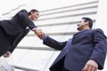 Business people shaking hands outside office Royalty Free Stock Photo