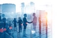 Business people shaking hands, skyscraper Royalty Free Stock Photo