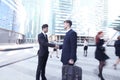 Business people shaking hands in street Royalty Free Stock Photo