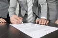 Business people sign contract