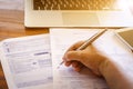 Business people signing documents,Business woman's hands writing on paper on desk Royalty Free Stock Photo