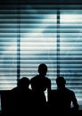 Business people silhouettes against building Royalty Free Stock Photo