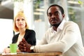 Business people sitting around a table during a meeting Royalty Free Stock Photo