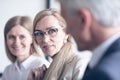 Business people sitting in a row Royalty Free Stock Photo