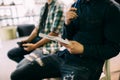 Business people sitting in a row and writing notes. Close-up of writing hands. Browse my portfolio for horizontal version. Royalty Free Stock Photo