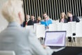 Business people sitting in seminar hall Royalty Free Stock Photo