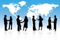 Business people are standing in front of a map Royalty Free Stock Photo