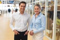 Business people standing together in corridor at office Royalty Free Stock Photo