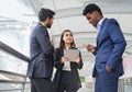 business people in suit standing and meeting outside office Royalty Free Stock Photo