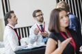 Business people talking during coffee break at convention center Royalty Free Stock Photo