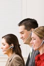 Business people talking on headsets Royalty Free Stock Photo