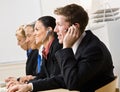 Business people talking on headsets Royalty Free Stock Photo