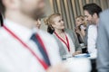 Business people talking at lobby in convention center Royalty Free Stock Photo