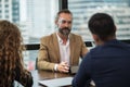 Business people team colleagues in modern office. Man and woman meeting conference and presentation in room Royalty Free Stock Photo