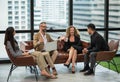 Business people team colleagues in modern office. Man and woman meeting conference and presentation in room Royalty Free Stock Photo