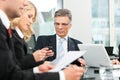 Business people - team meeting in an office Royalty Free Stock Photo