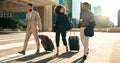 Business people, team walking and travel with suitcase in city for corporate, job opportunity and networking Royalty Free Stock Photo