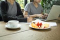 Business people team work with laptop with fresh fruit